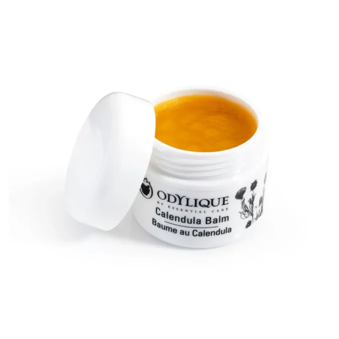 Odylique Baume au Calendula 50g – pot ouvert texture baume jaune orangé